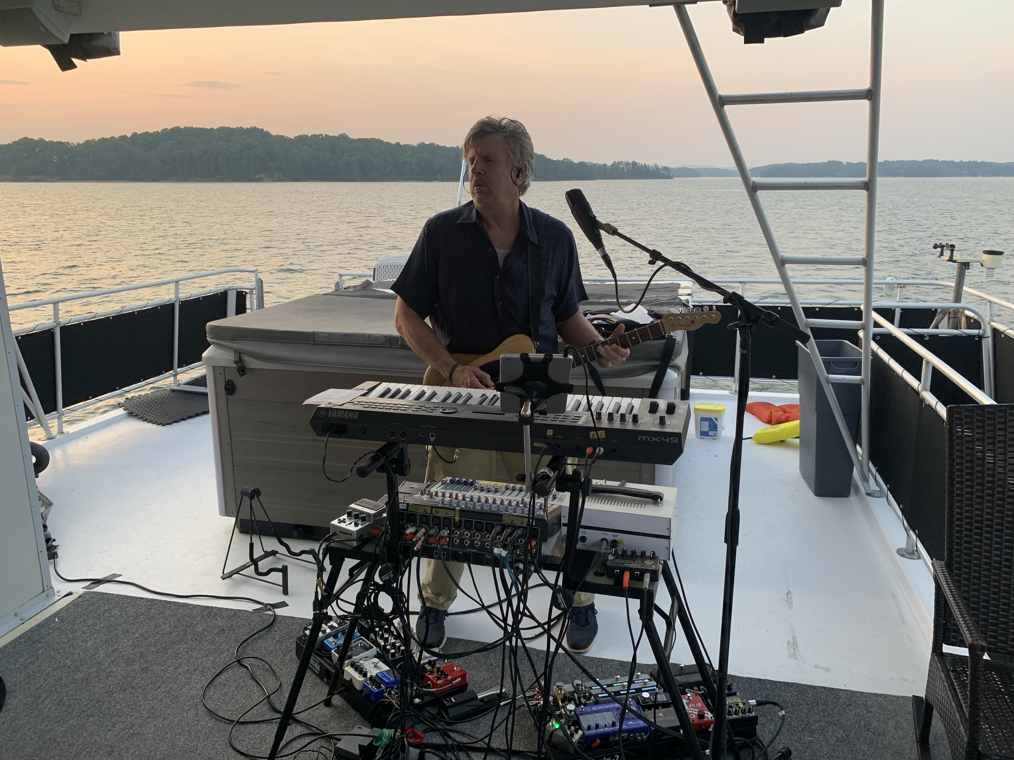 Mike McLeod performing on a sunset cruise at Lake Lanier